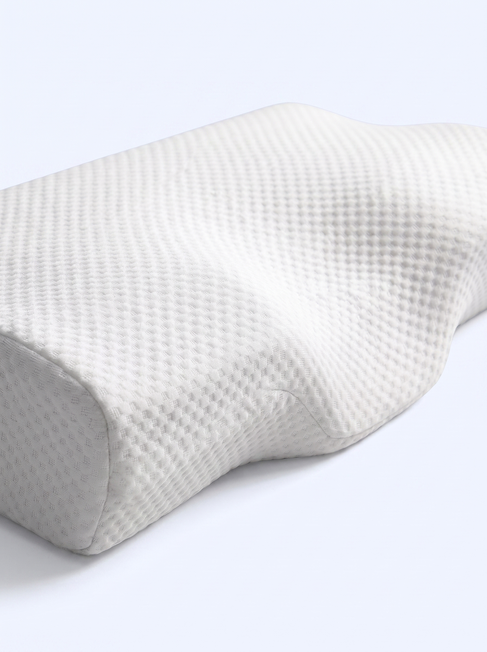 Close-up of the SanaSleep contour pillow showing the contour recess and cover texture